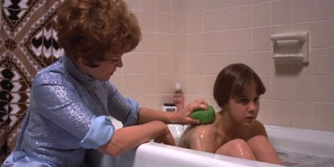 Chris gives Regan a bath in The Exorcist