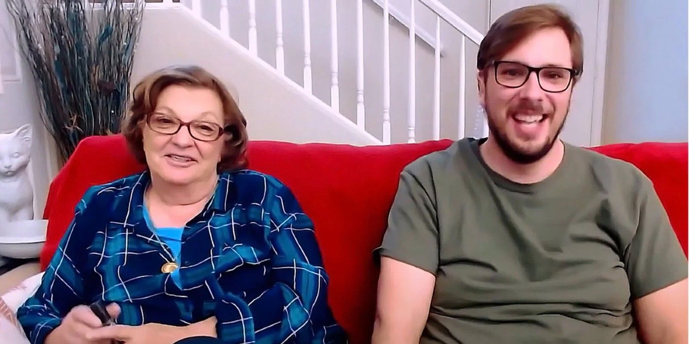 Colt and Debbie Johnson from 90 Day Fiancé smiling on couch