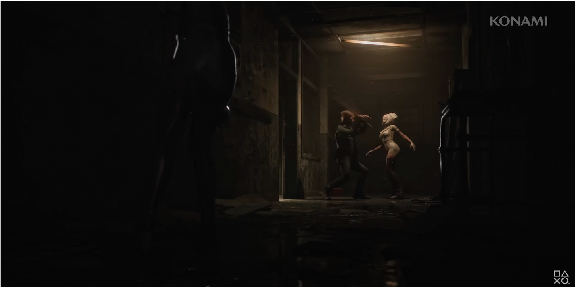 A shot from Silent Hill 2 Remake trailer showing James fighting a nurse. 