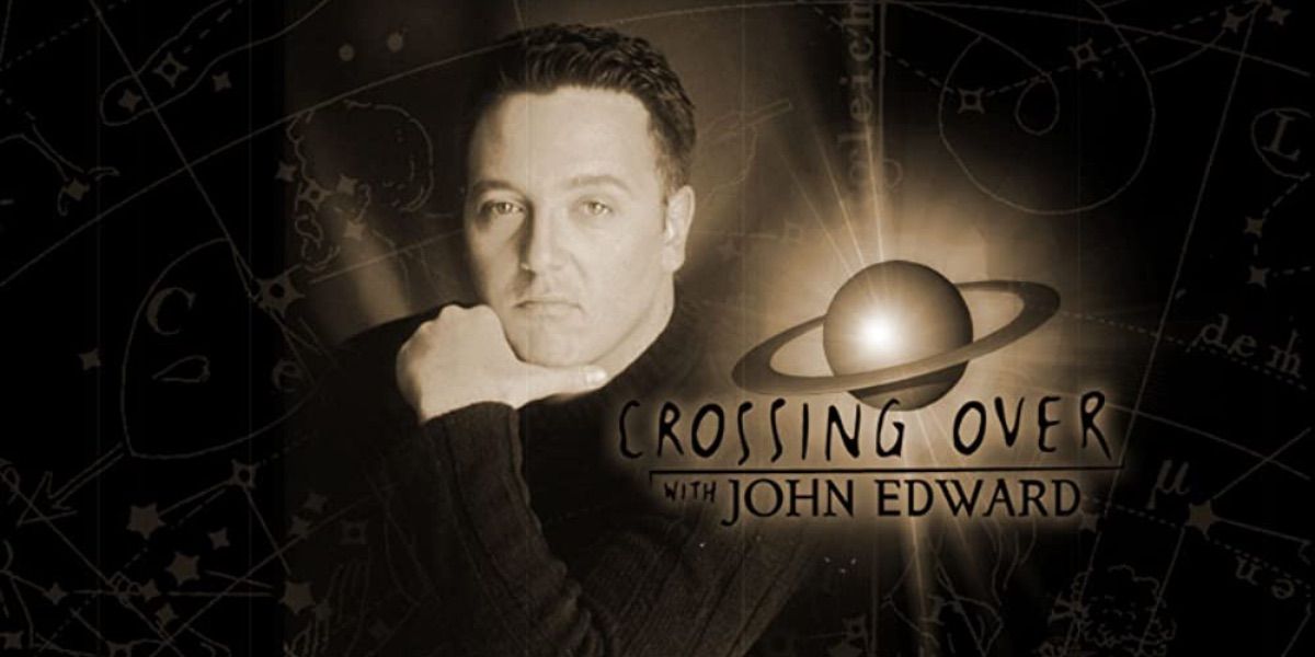 John Edward poses in a production photo for Crossing Over