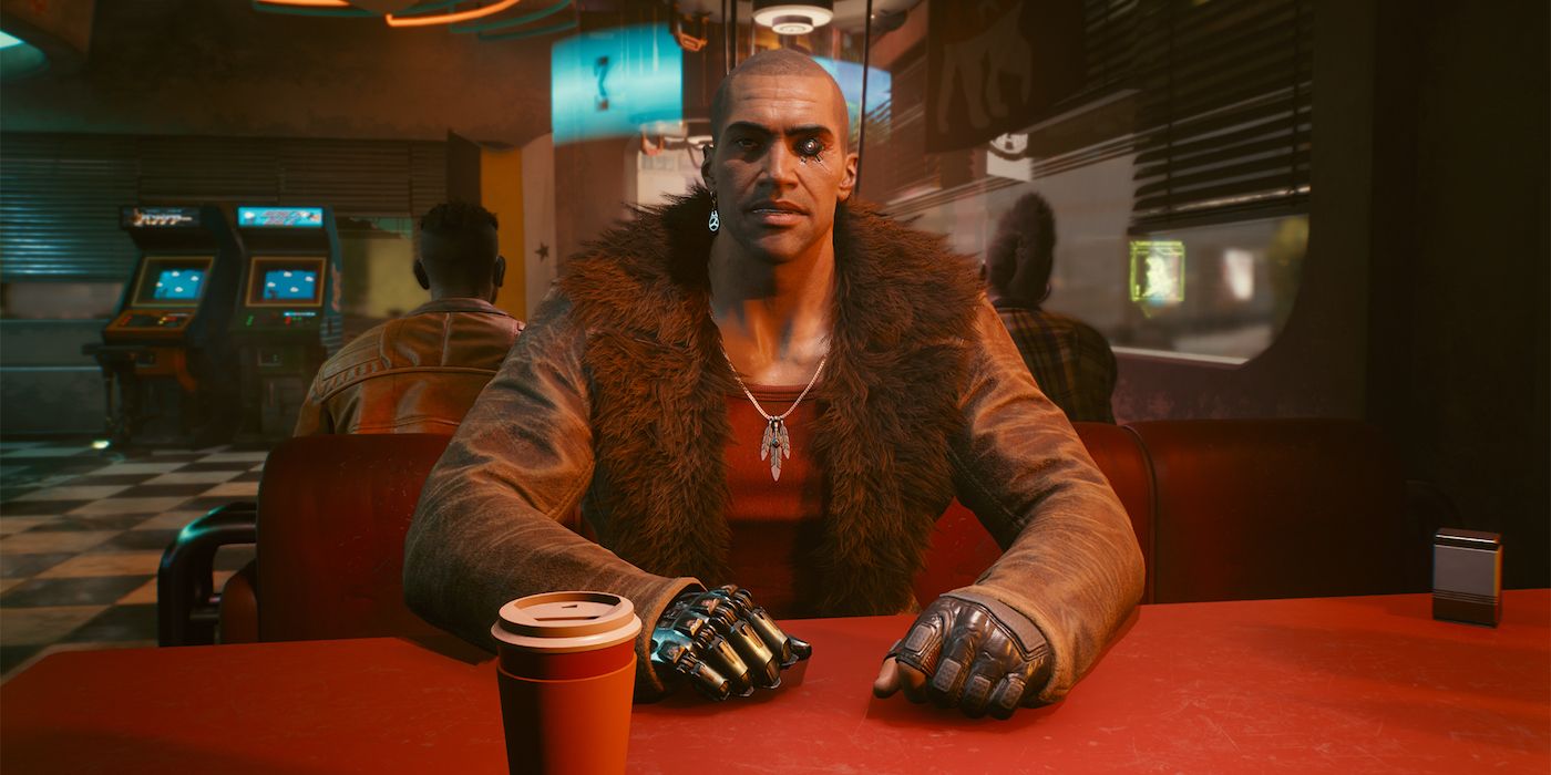 River sitting across from the player in dining booth in Cyberpunk 2077