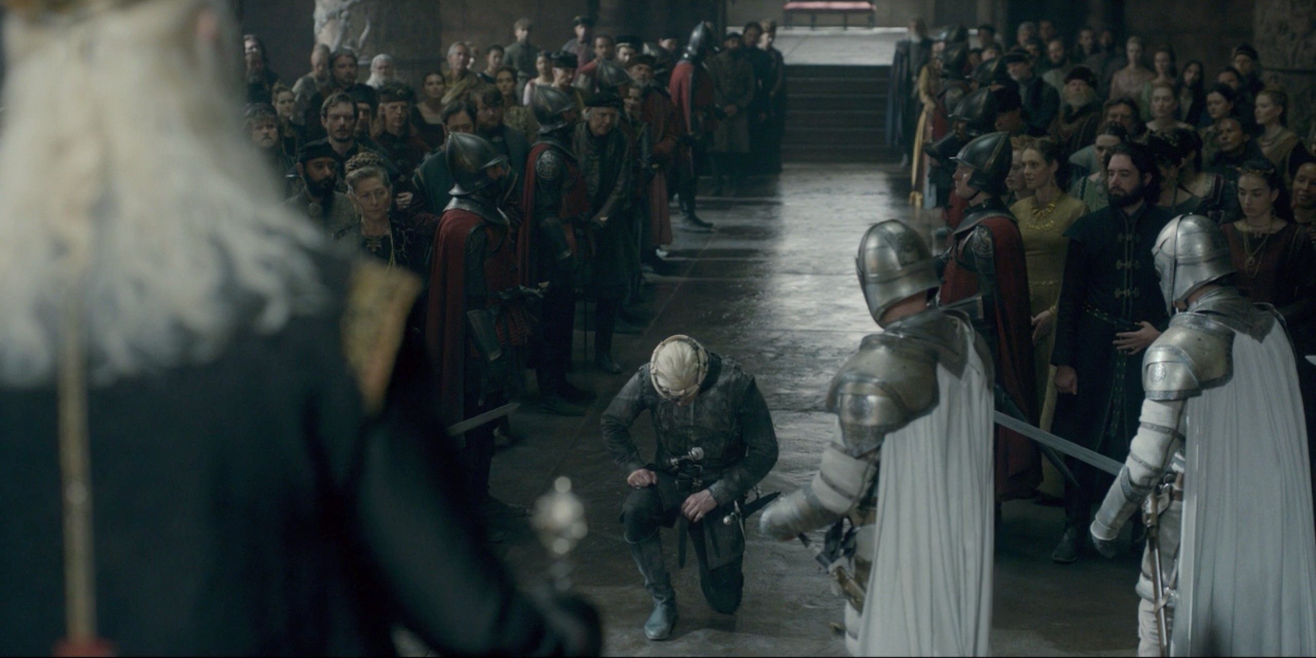 Daemon kneeling before Viserys on House of the Dragon
