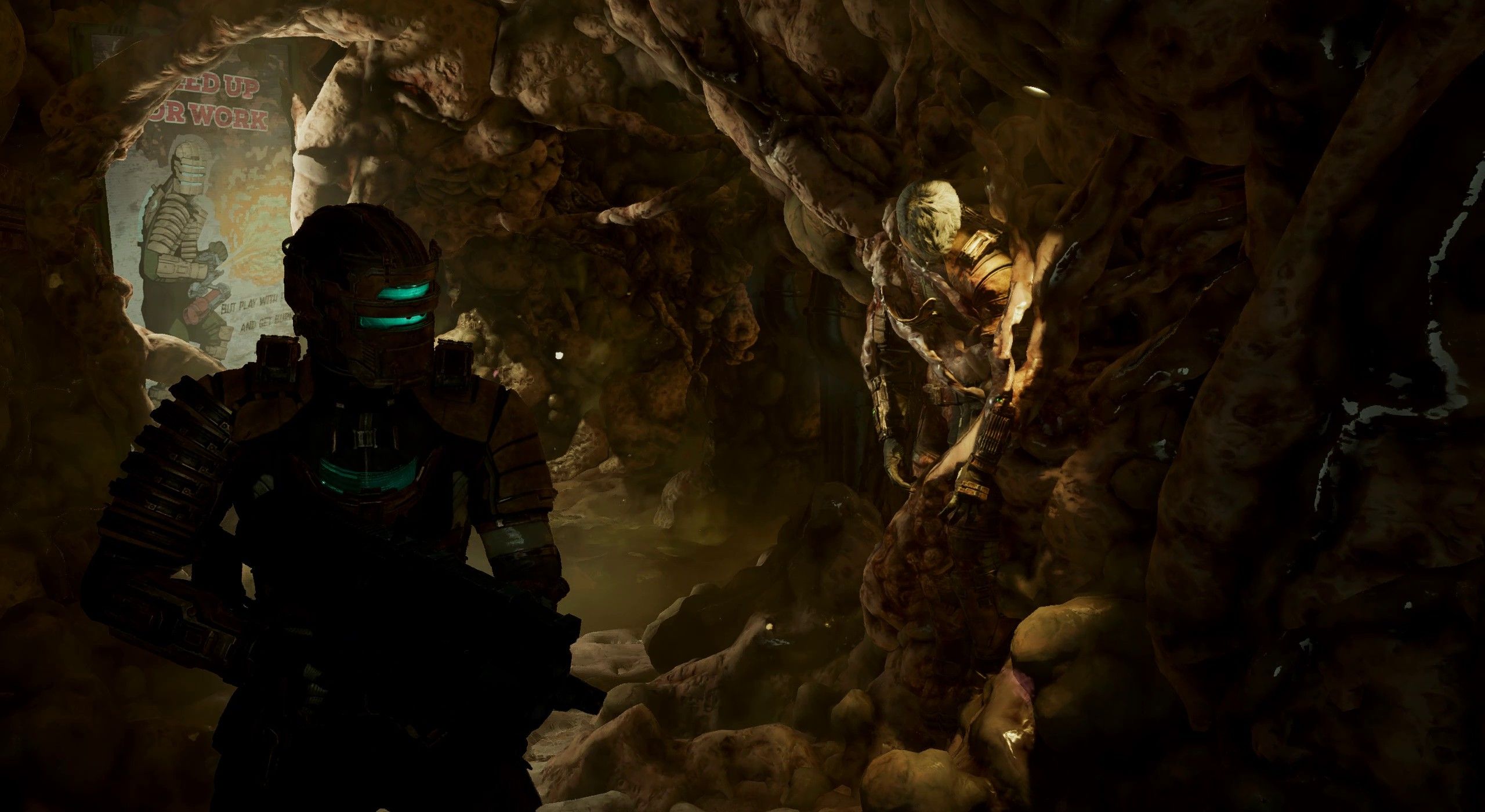Isaac Clarke from the Dead Space remake preview stands with a flamethrower in front of a mangled body.