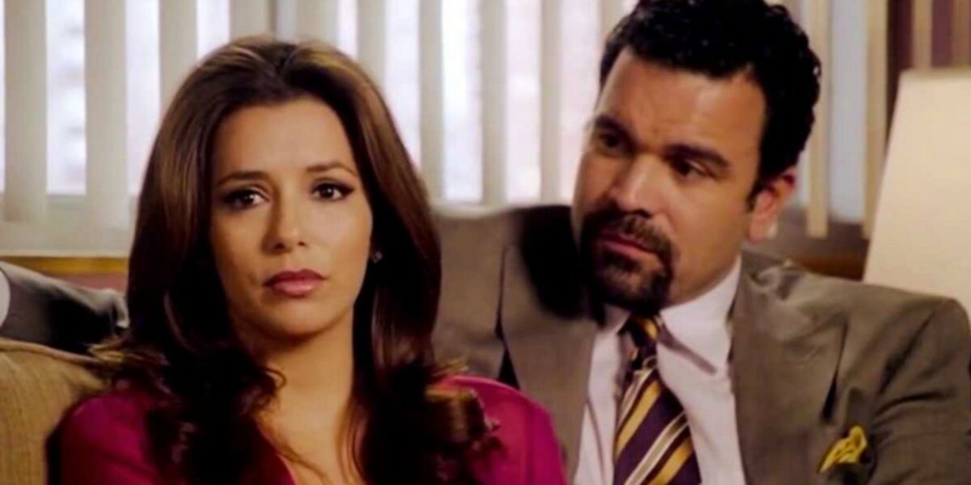 Gabby looking sad sitting next to Carlos on Desperate Housewives
