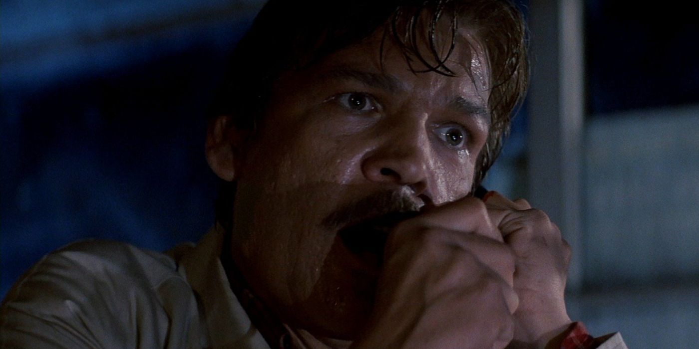 Dr Daniel Challis screams into a phone in Halloween III Season of the Witch to try to stop the Silver Shamrock television surprise from airing