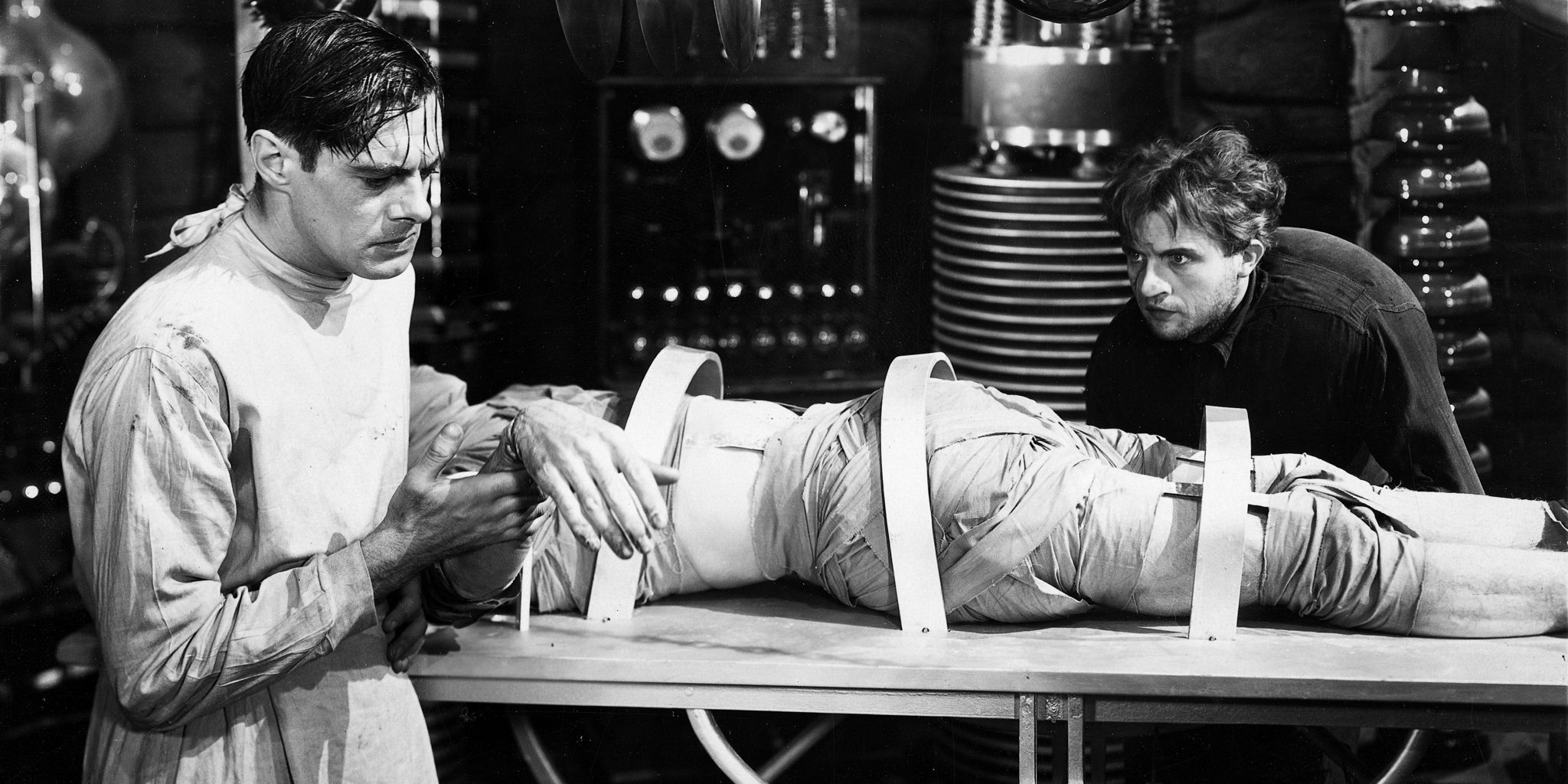 Dr Frankenstein and Igor working on the monster in Frankenstein 1931