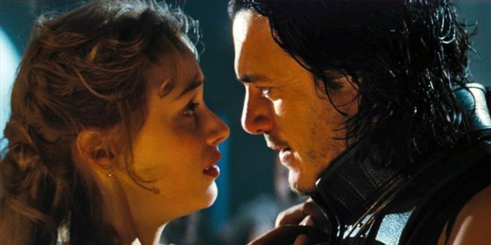 Luke Evans and Sarah Gordon standing close together in Dracula Untold