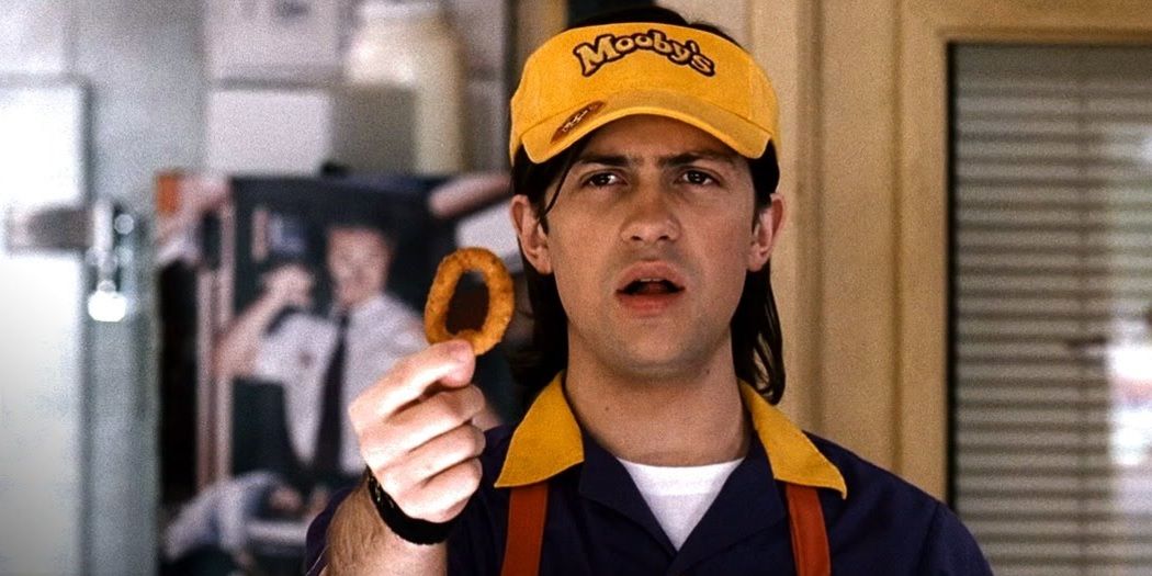 Elias holding an onion ring in Clerks 2