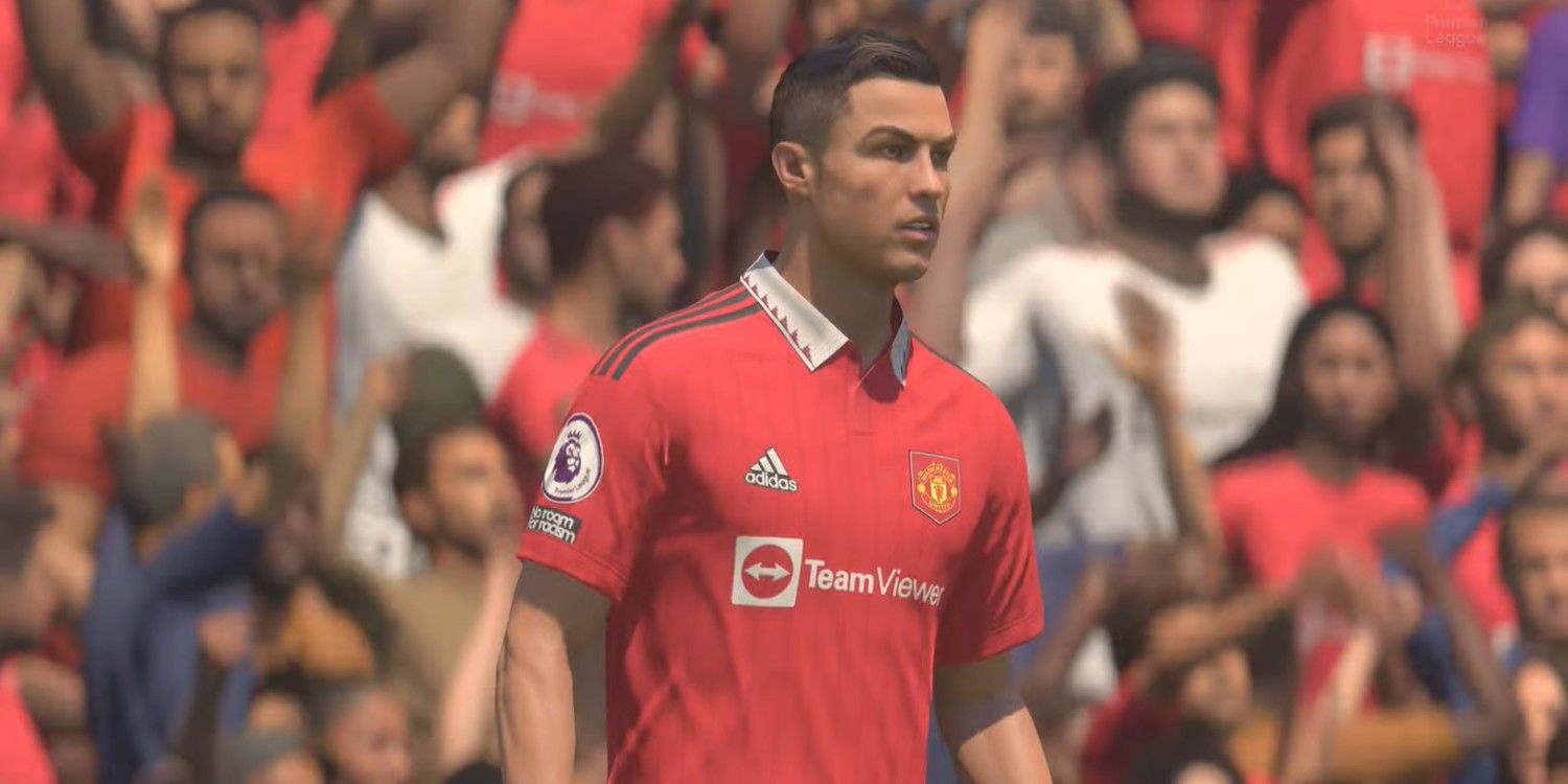 Cristiano Ronaldo wearing a Manchester United top