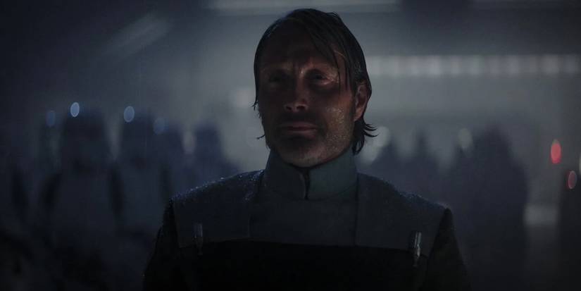 Galen Erso standing in the rain in Rogue One