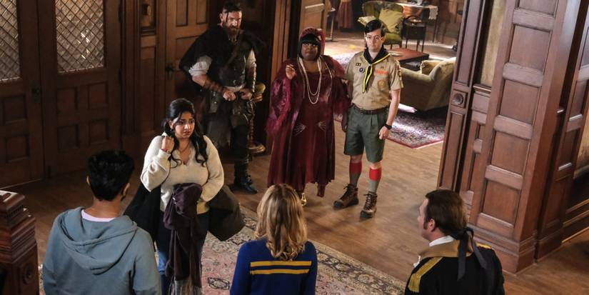 Jay's sister Bela surrounded by ghosts in CBS Ghosts