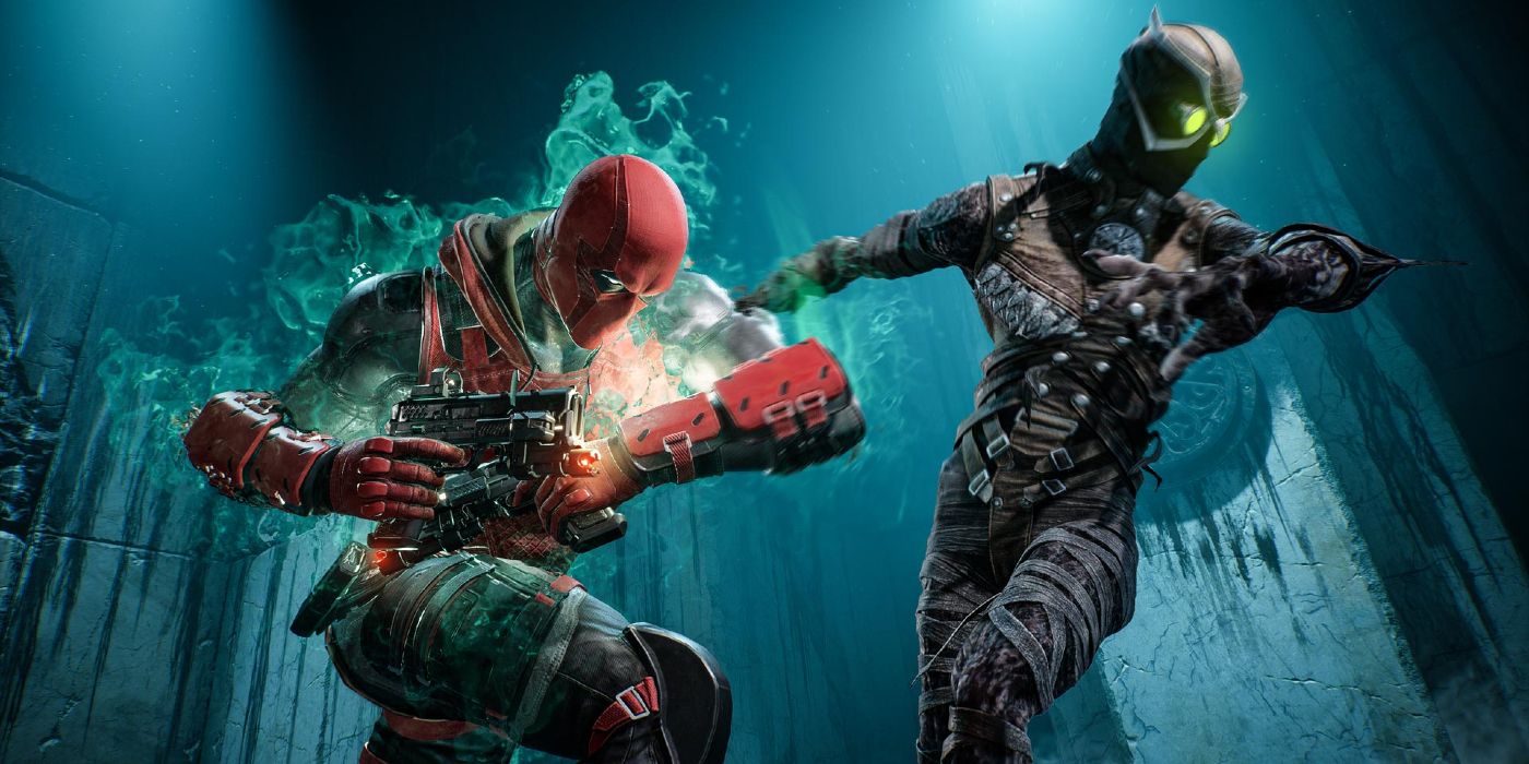 Image of Red Hood fighting a Talon in Gotham Knights. Jason is firing his handgun at the Talon assassin, with a mystic green glow emanating from his character model.