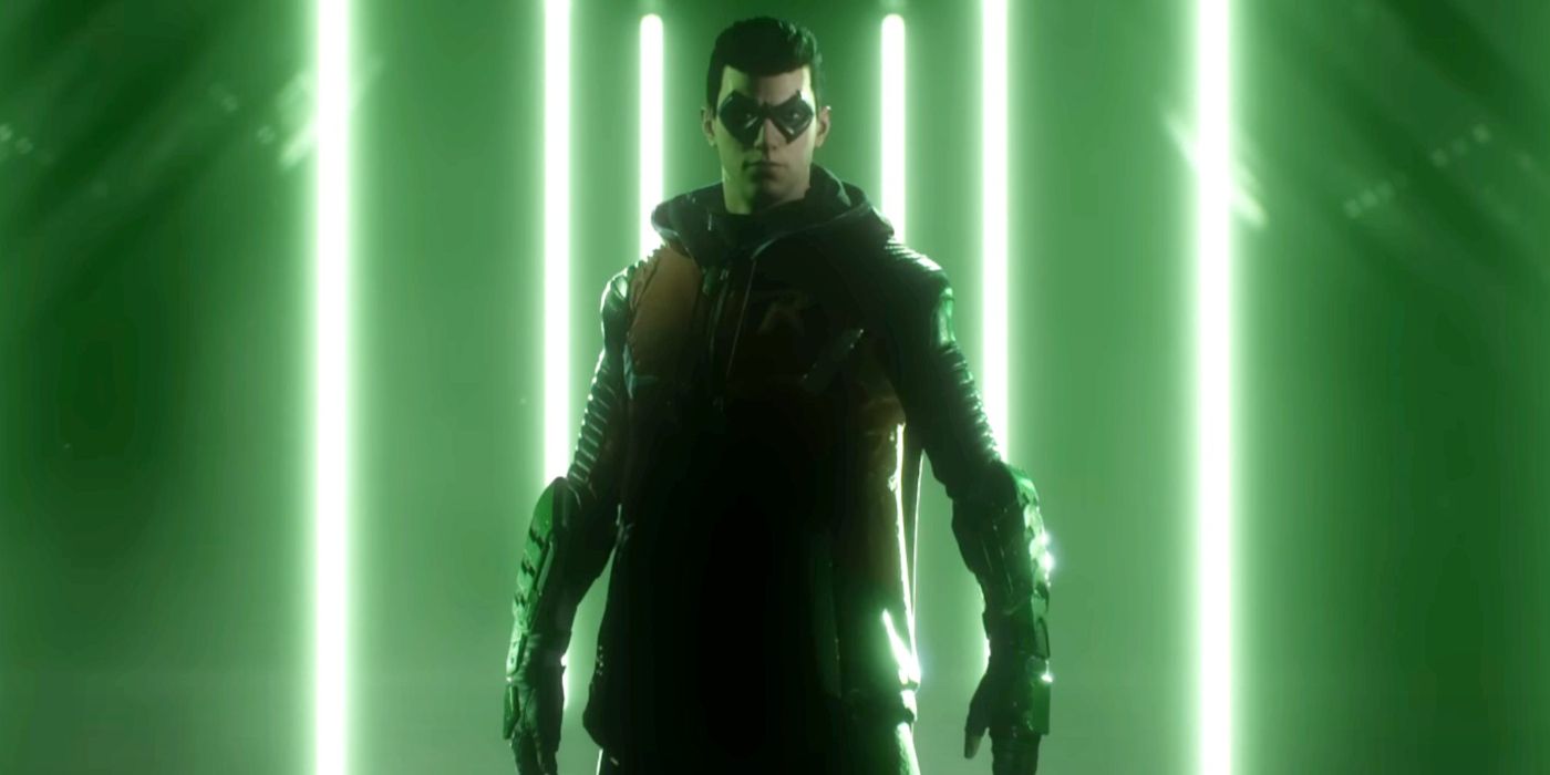 Robin standing in fornt of green neon lights in Gotham Knights.