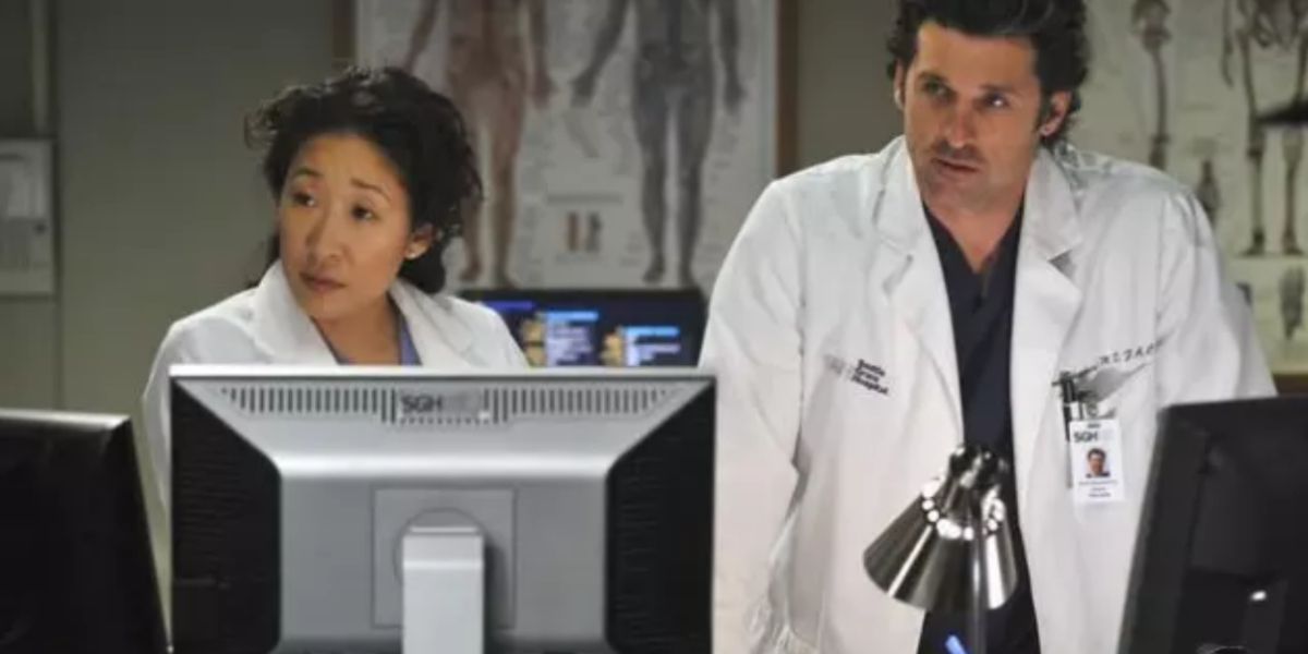 Cristina Yang e Derek Shepherd em Grey's Anatomy trabalhando atrás de computadores