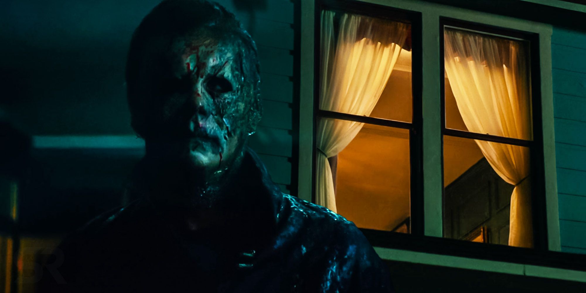 Halloween Ends Michael outside Myers house window