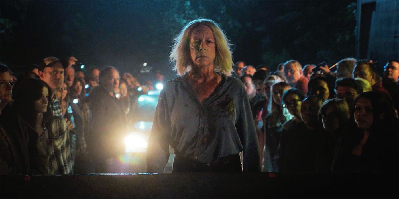 Laurie watches Michael's body get destroyed at a junkyard in Halloween Ends 