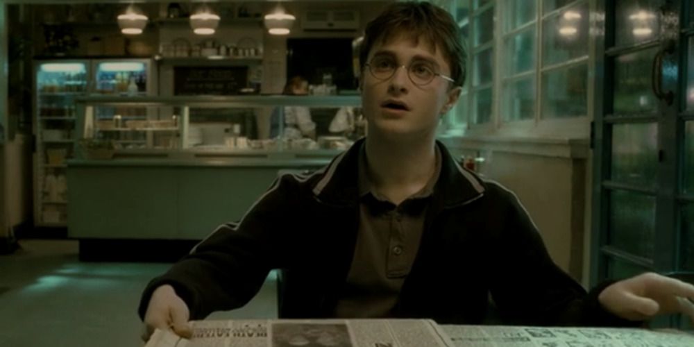 Harry with a newspaper in Half Blood Prince 