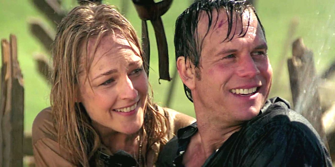 Helen Hunt and Bill Paxton in Twister getting wet and smiling with excitement