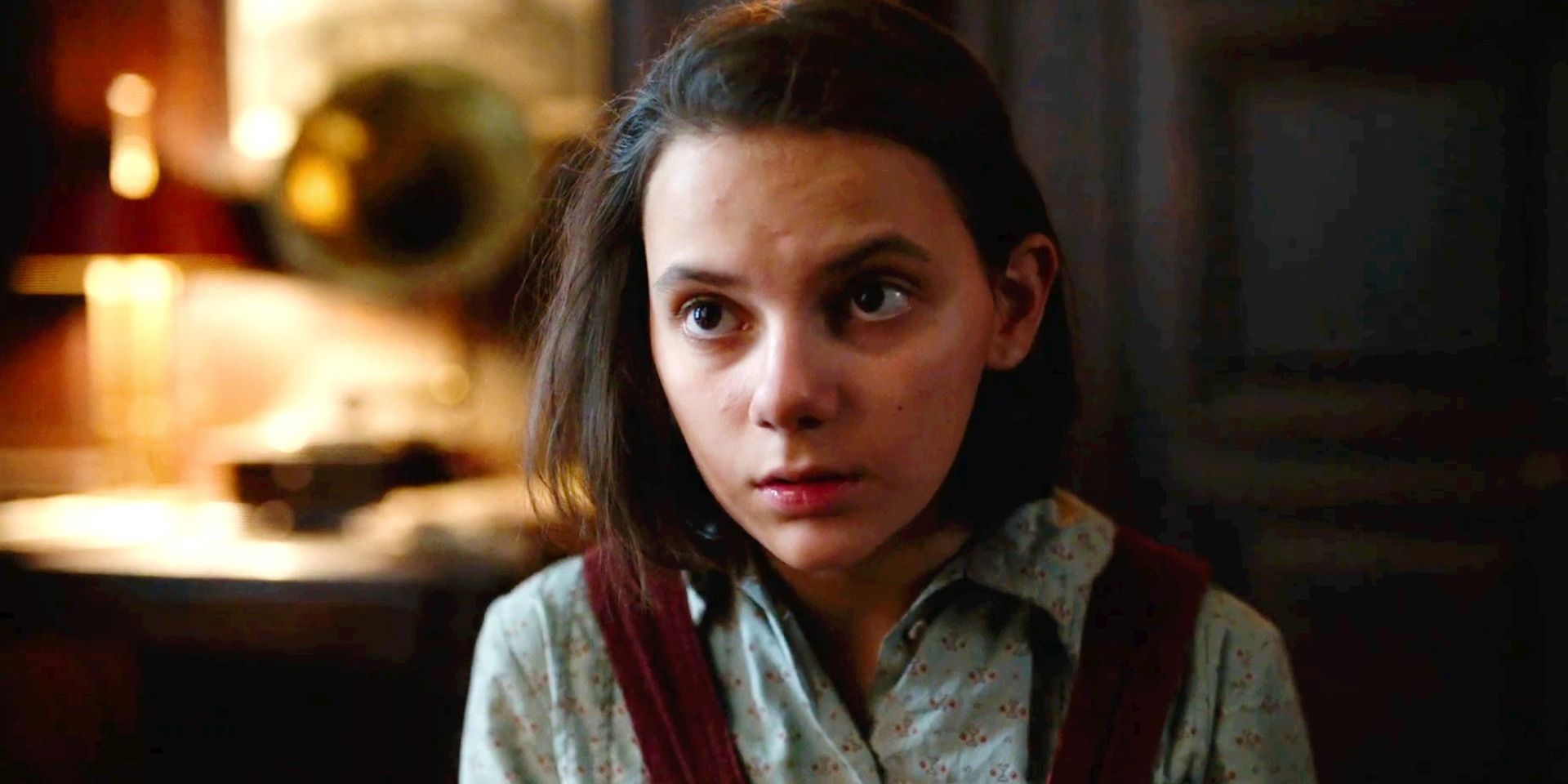 Lyra looking serious in His Dark Materials