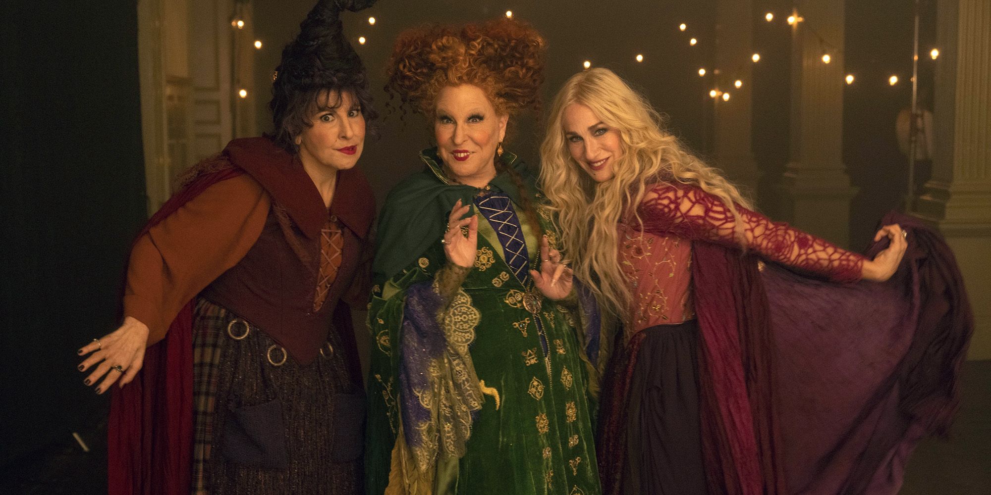 The Sanderson sisters posing together for a photo in Hocus Pocus 2.