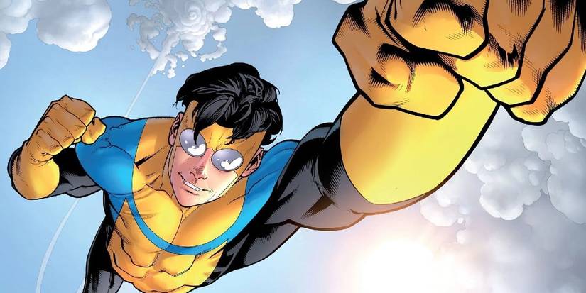 Invincible flying through a sky on a perfect, partially cloudy day.