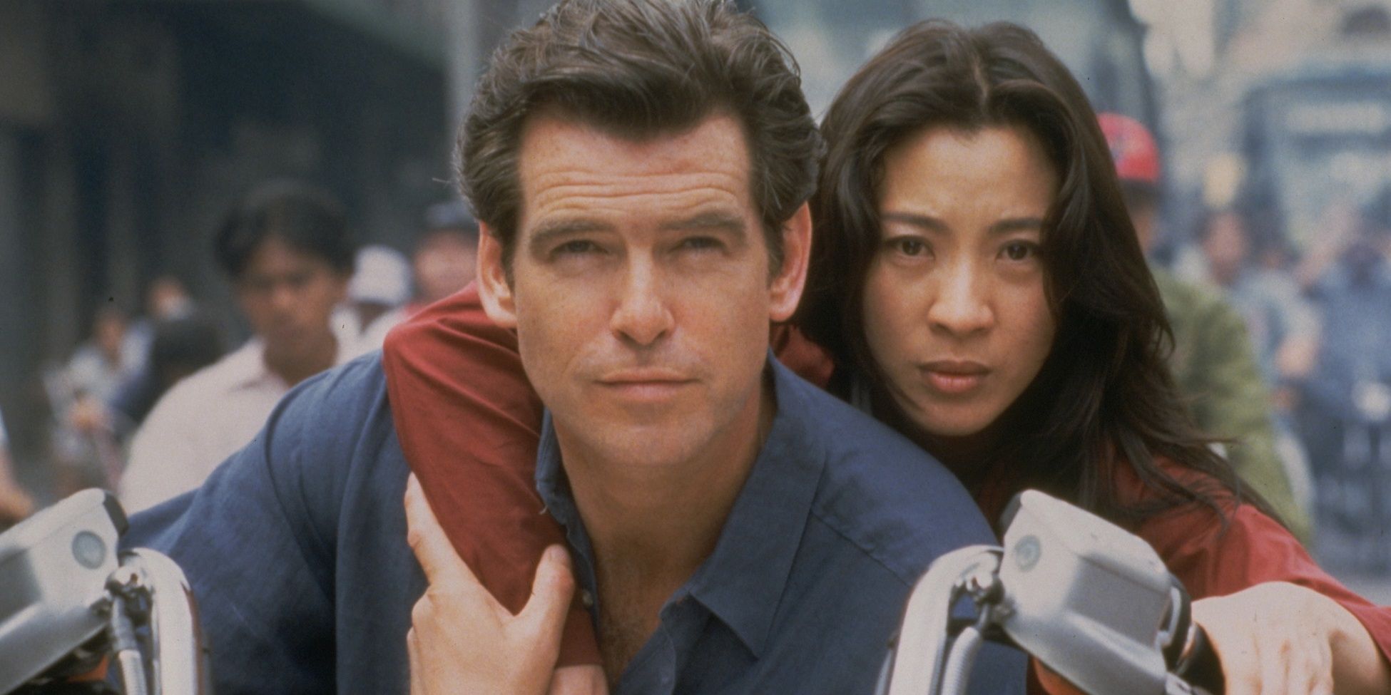 James Bond and Wai Lin on a motorcycle in Tomorrow Never Dies