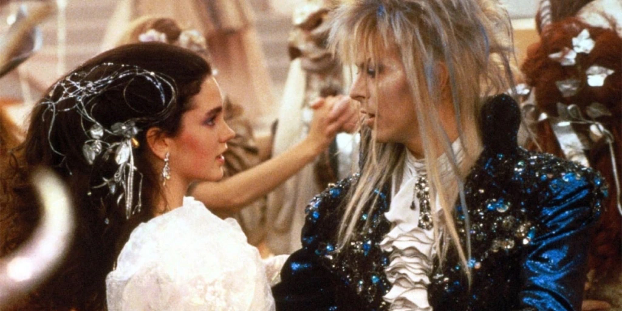 Jennifer Connelly and David Bowie stand together in Labyrinth (1986)
