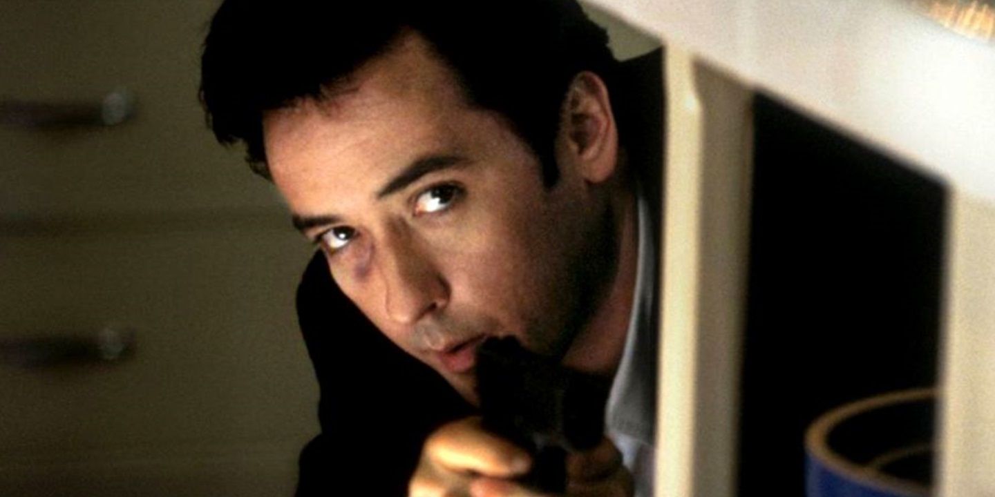John Cusack with a gun in Grosse Pointe Blank