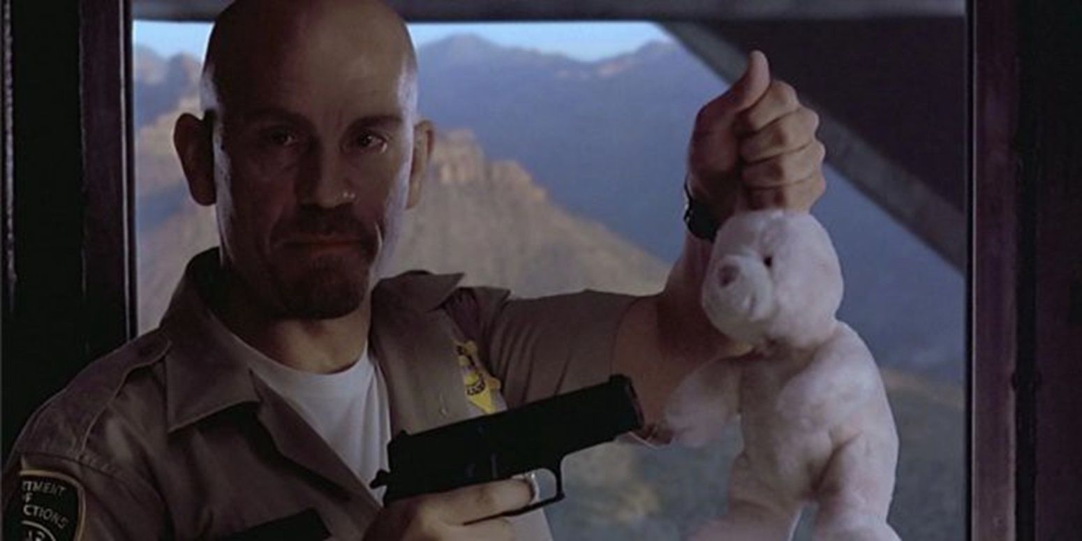 John Malkovich holds a plush rabbit at gunpoint in Con Air