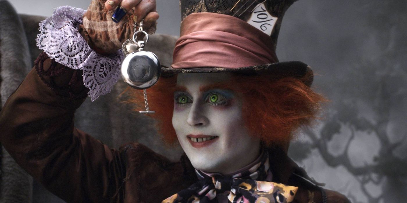 Johnny Depp as the Mad Hatter holding up a watch in Alice in Wonderland