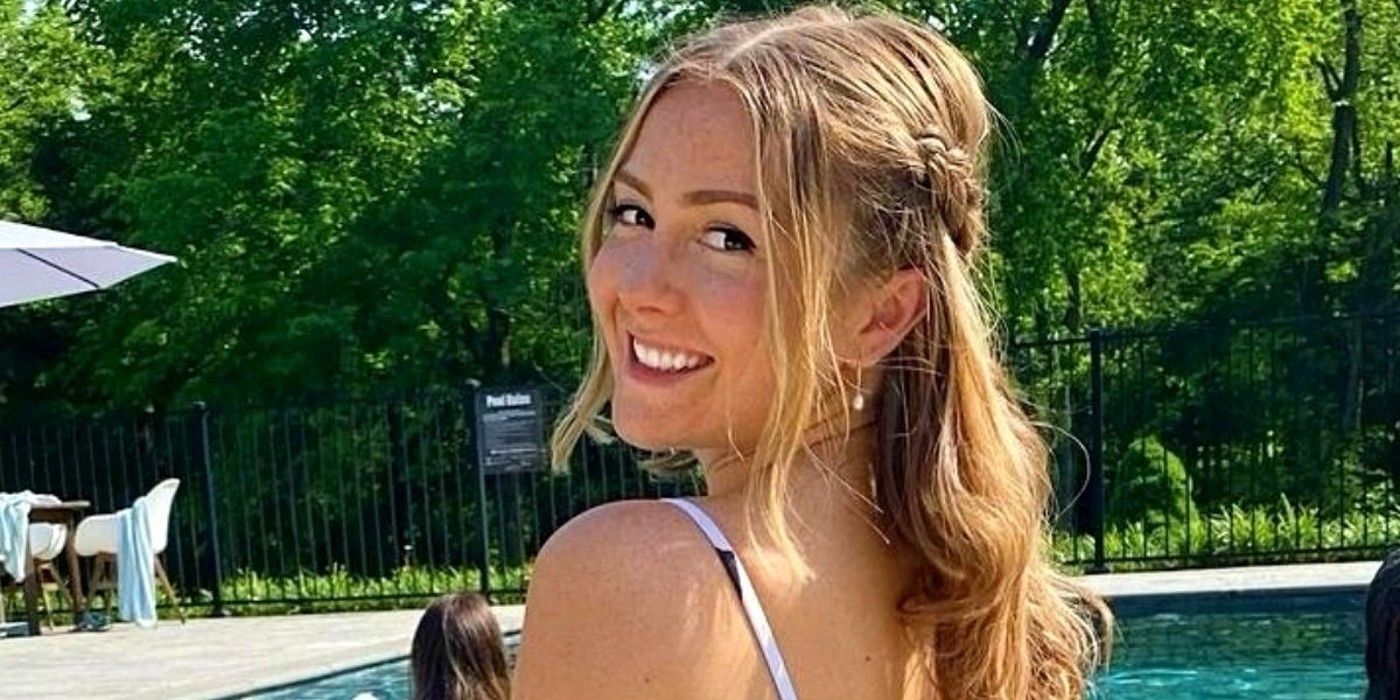 Kara Bass 90 Day Fiance looking over shoulder near swimming pool