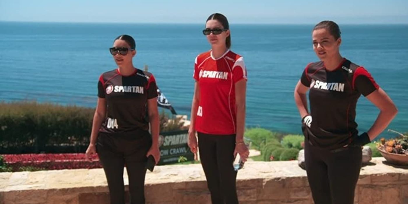 Kim, Kendall, and Khloe dressed in athletic gear for a competition on KUWTK