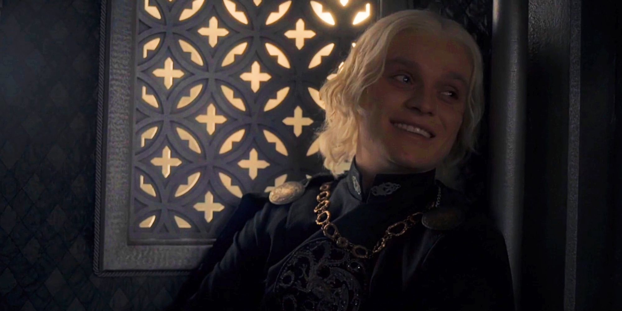 Aegon leaning back and smiling