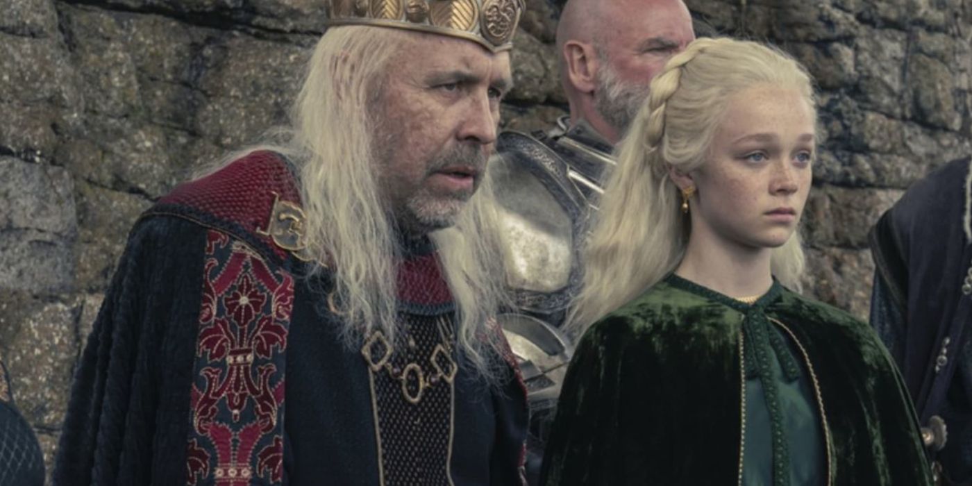 King Viserys I Targaryen with Helaena at Laena Velaryon's funeral.