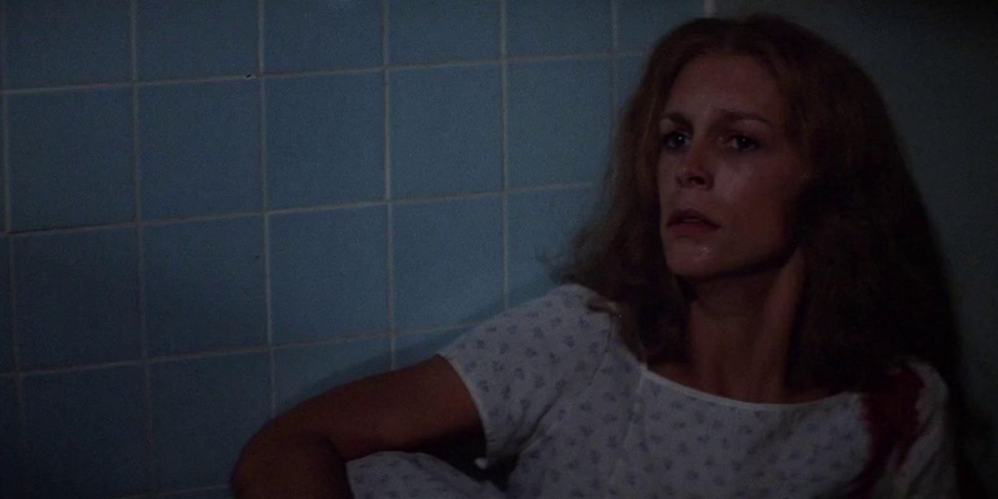 Laurie Strode cowers in the corner in Halloween II 1981