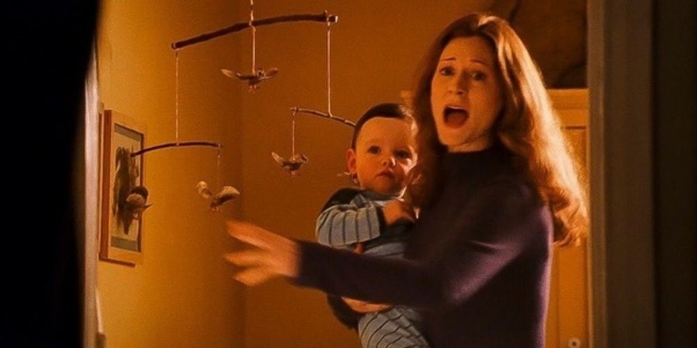 Lily Potter screams while holding Harry in Sorcerer's Stone 