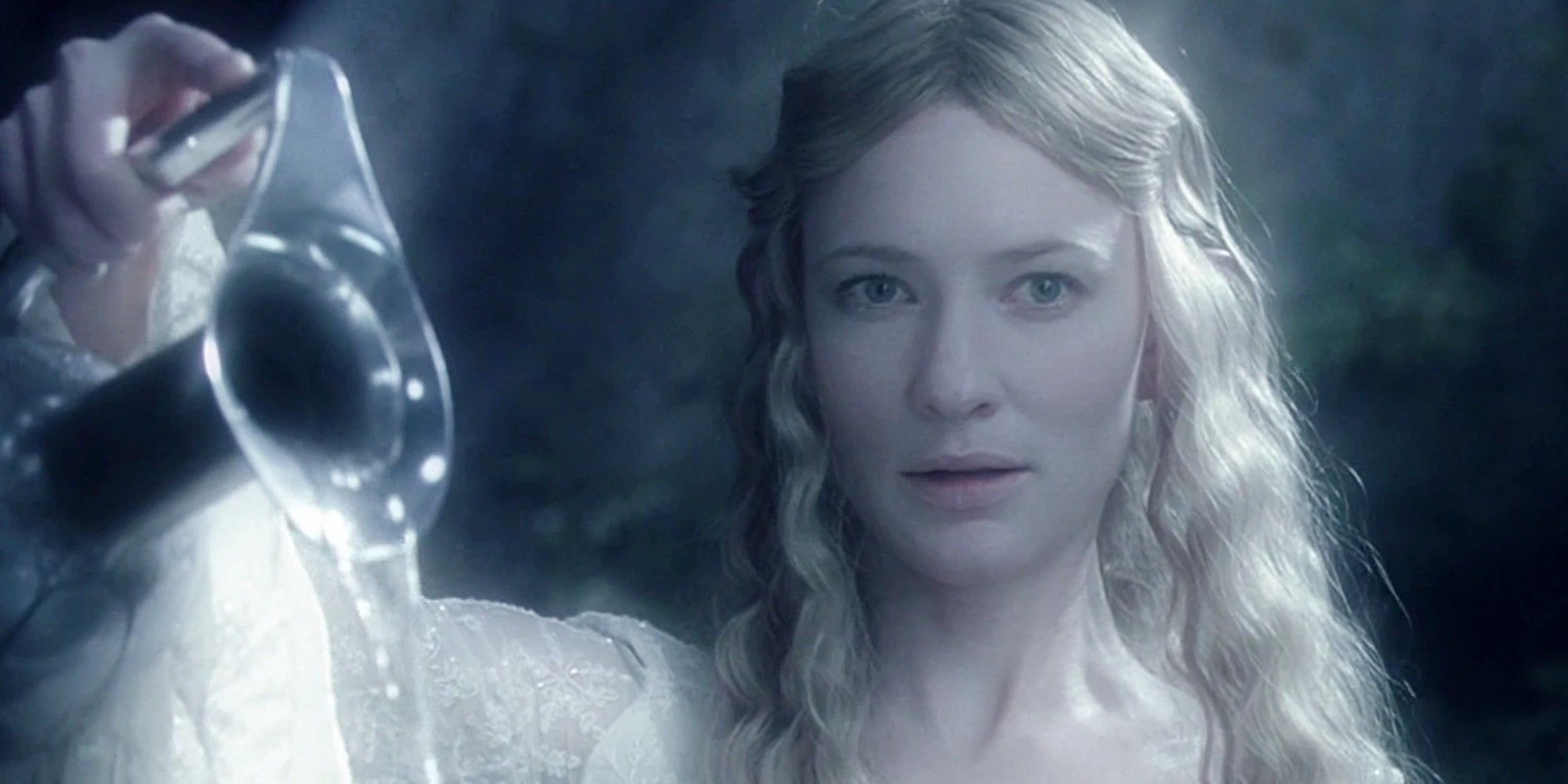 Galadriel pouring water from a pitcher in The Lord of the Rings. 