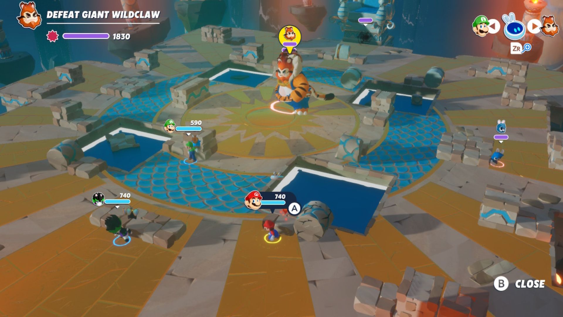 Mario + Rabbids cast battling the Giant Wildclaw boss