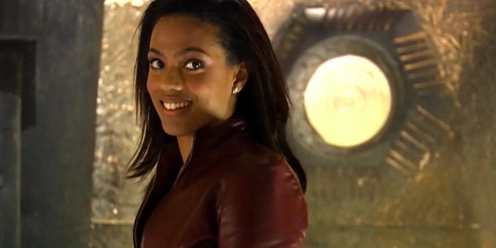 Martha Jones turns around and smiles in Doctor Who