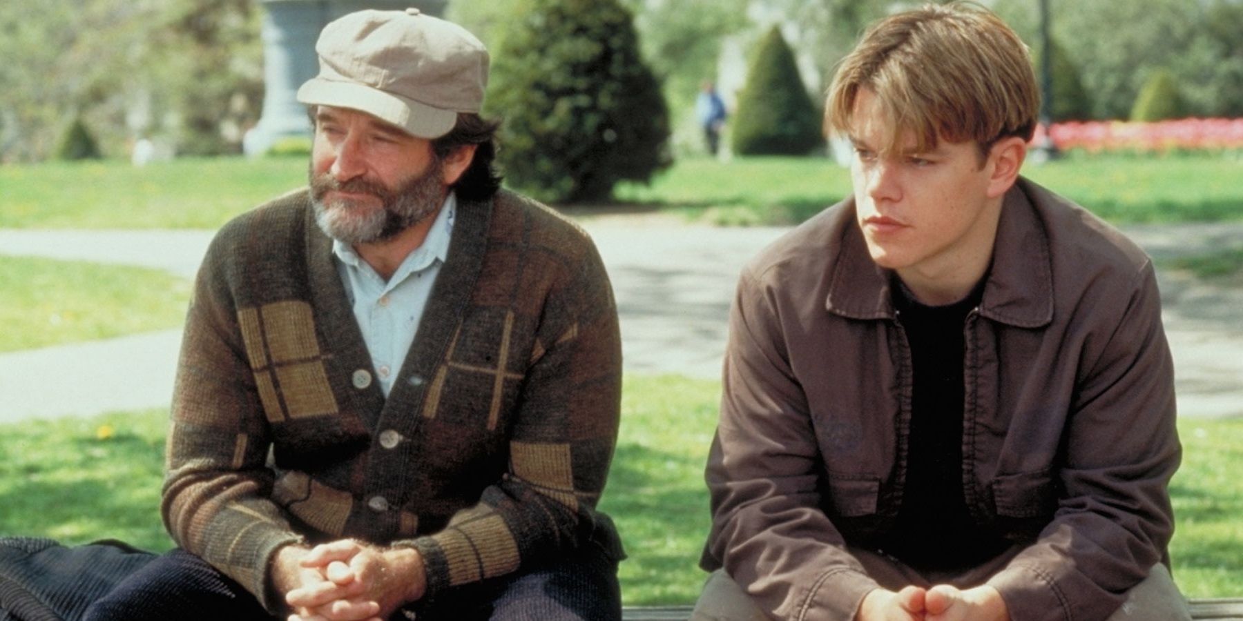 Matt Damon and Robin Williams on a park bench in Good Will Hunting