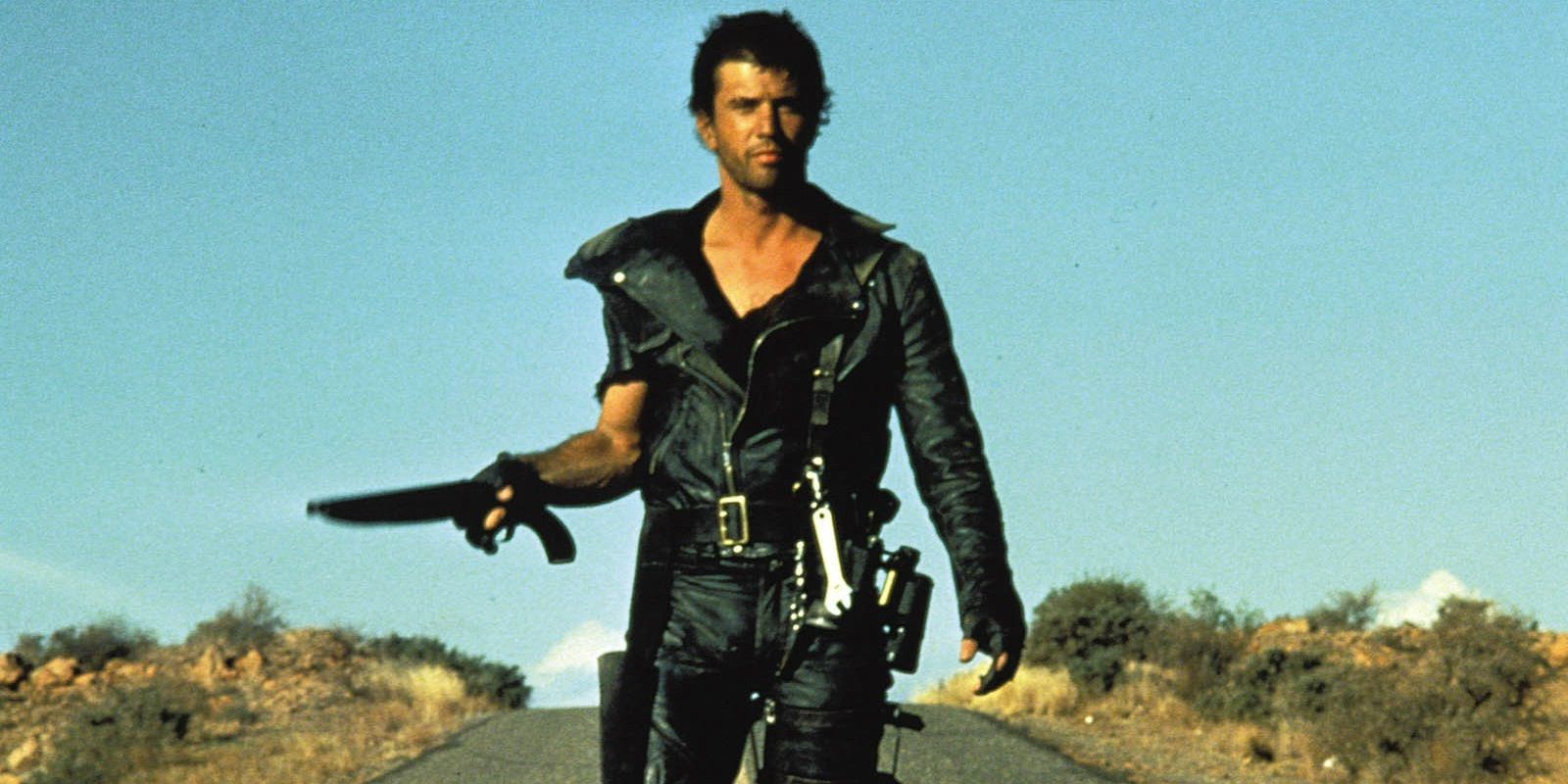 Mel Gibson com uma espingarda em The Road Warrior