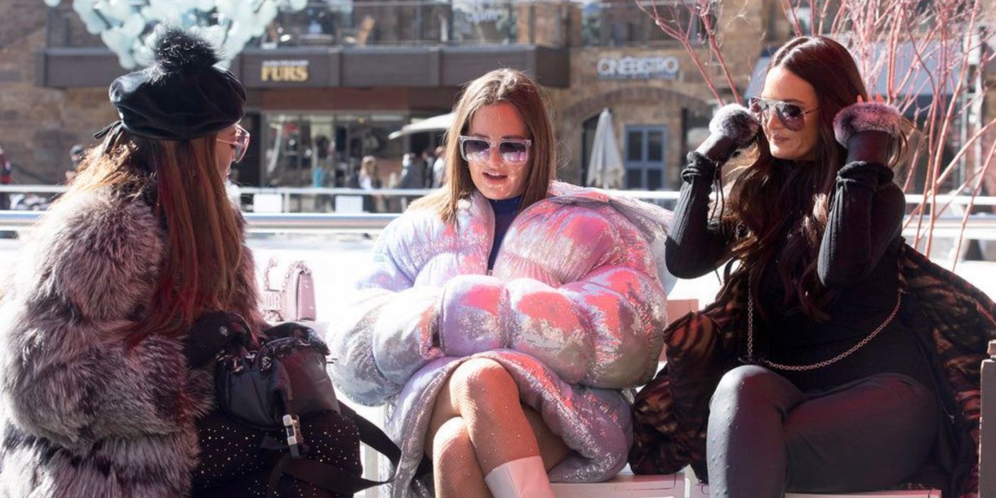 Meredith and Lisa and Mary talk in the snow on RHOSLC