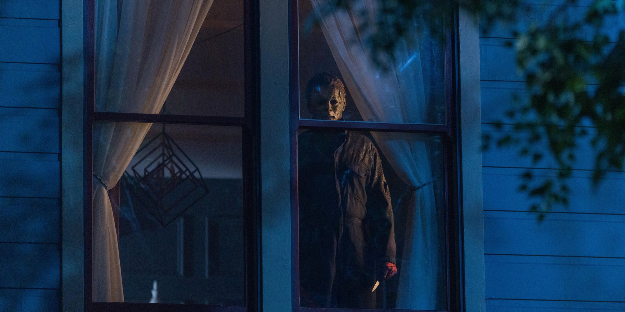 Michael Myers Looking Out Window in Halloween Kills