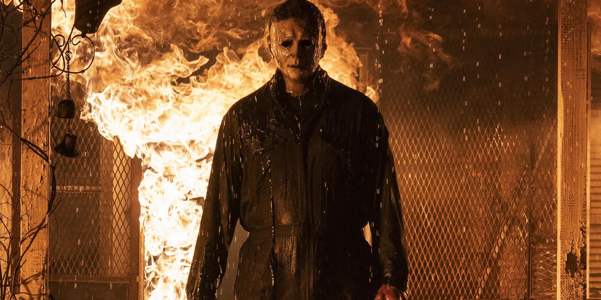 Michael Myers escapes from a burning house in Halloween Kills