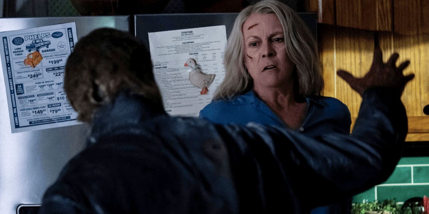 Michael Myers and Laurie Strode fighting in Halloween Ends