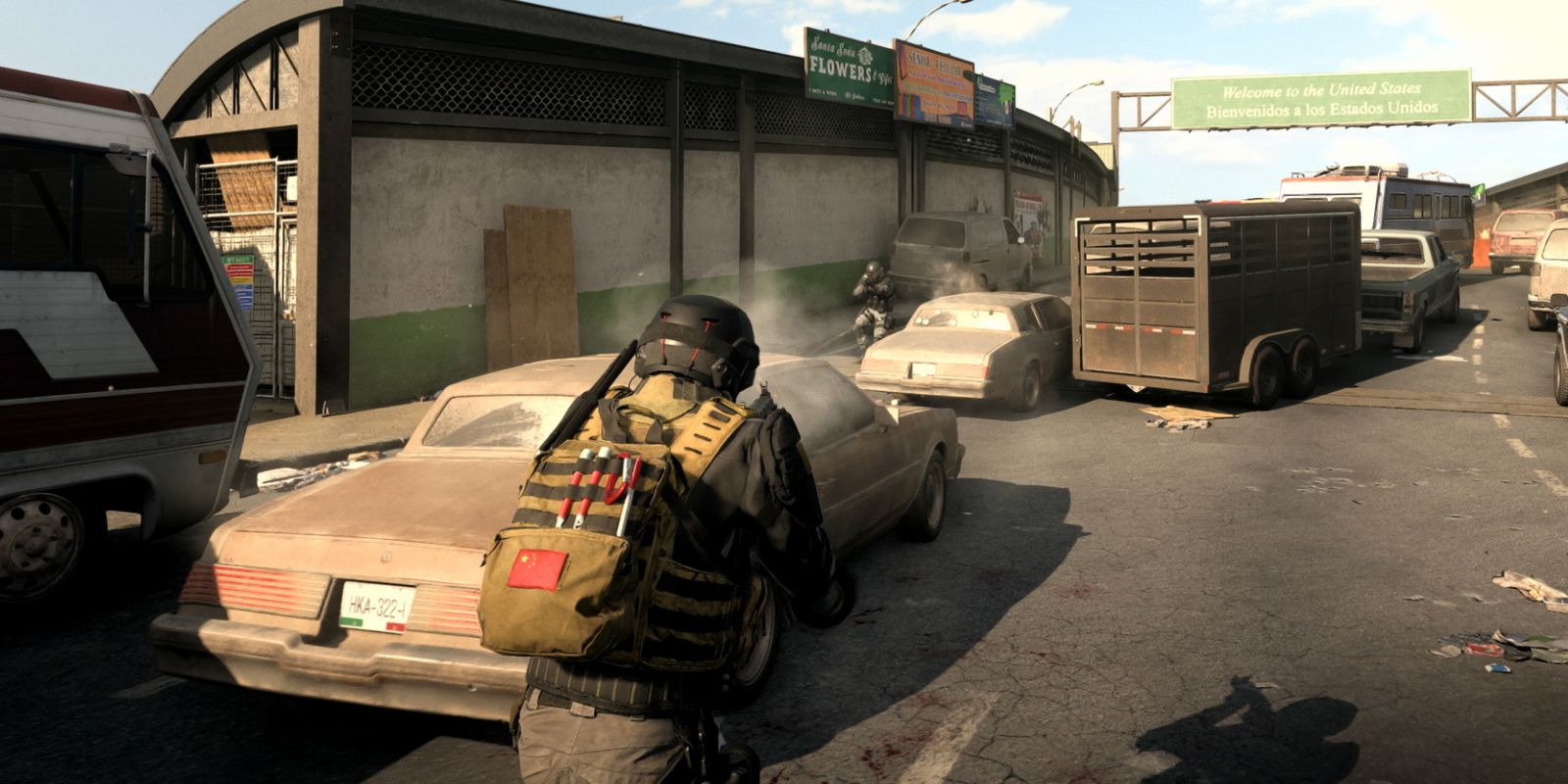 A player advancing across a bridge in Modern Warfare 2 in third person mode.