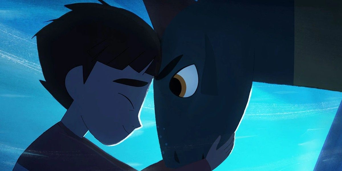 A boy touching heads with a dragon in My Father&rsquo;s Dragon