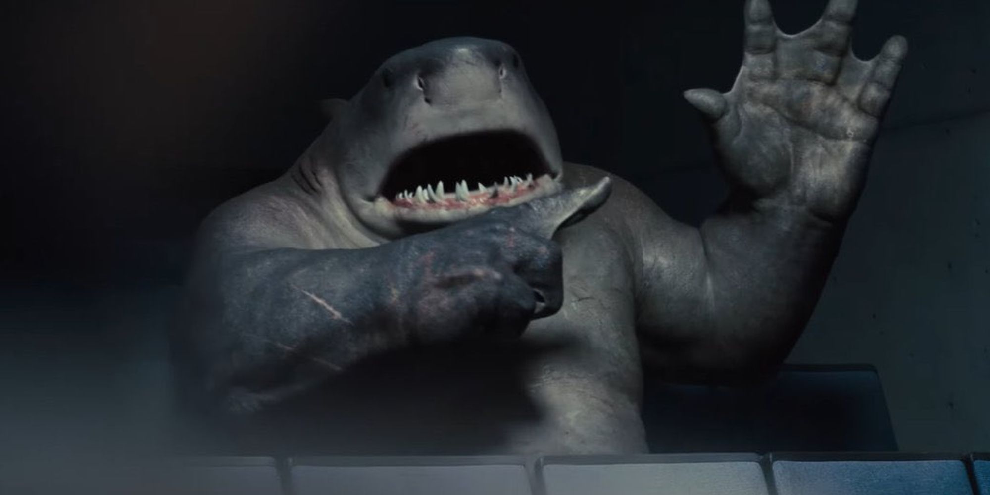 Nanaue AKA King Shark point out his hand in James Gunn&rsquo;s The Suicide Squad (2021)