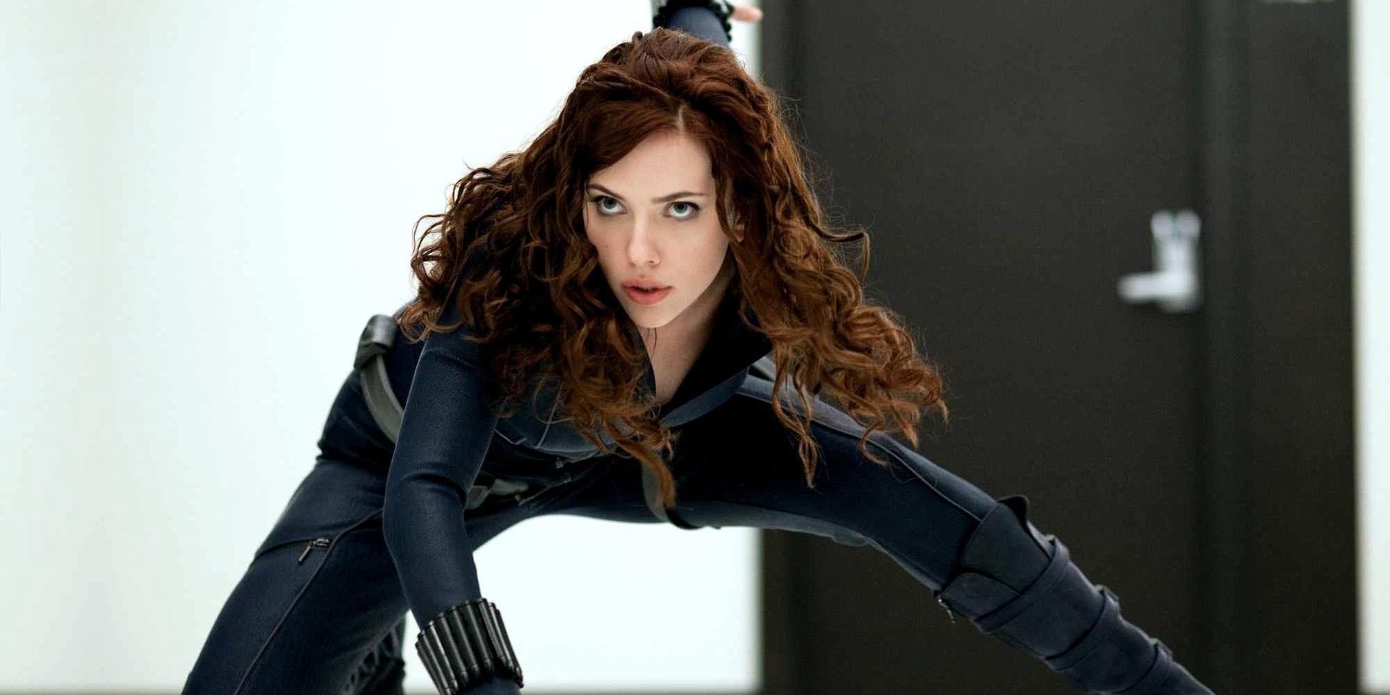 Natasha Romanoff does the Black Widow pose in Iron Man 2 