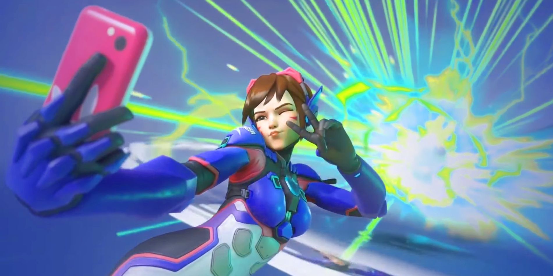 HIghlight intro of Overwatch 2 tank character Dva taking a selfie with her phone while wearing her new skin. 